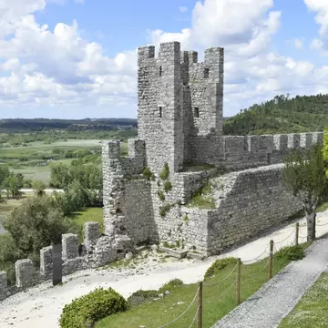 View of the ruins of the Castle of Montemor-o-Velho in Portugal, with views of the surrounding rice-paddies.