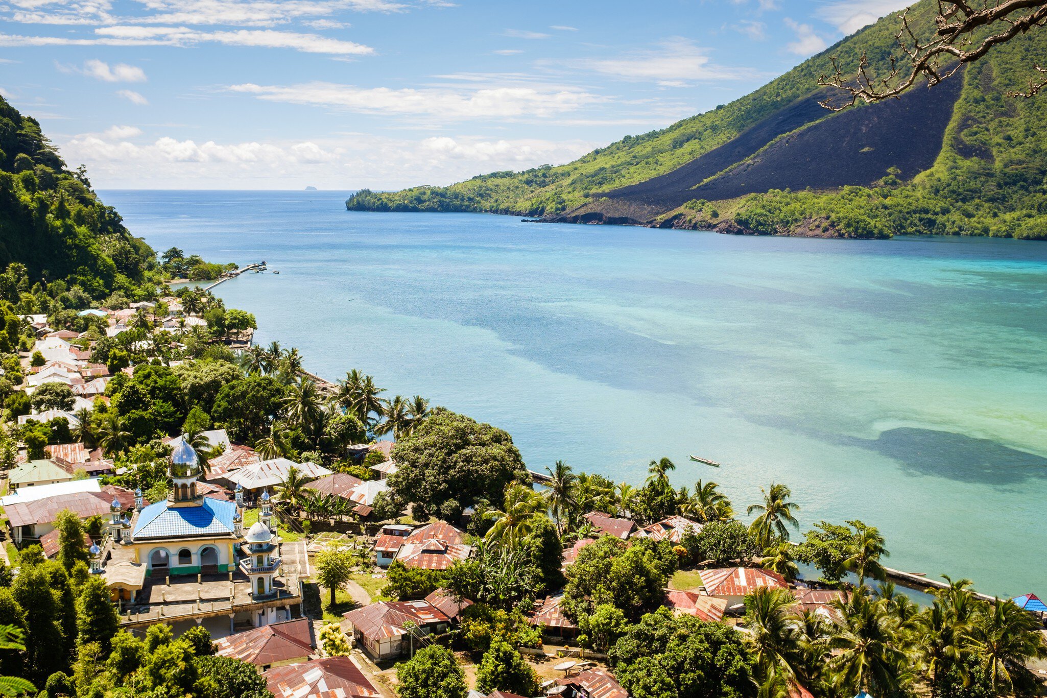 Hike, surf and learn about Sumatra's diverse culture with these top travel itineraries. Croesej/Getty Images
