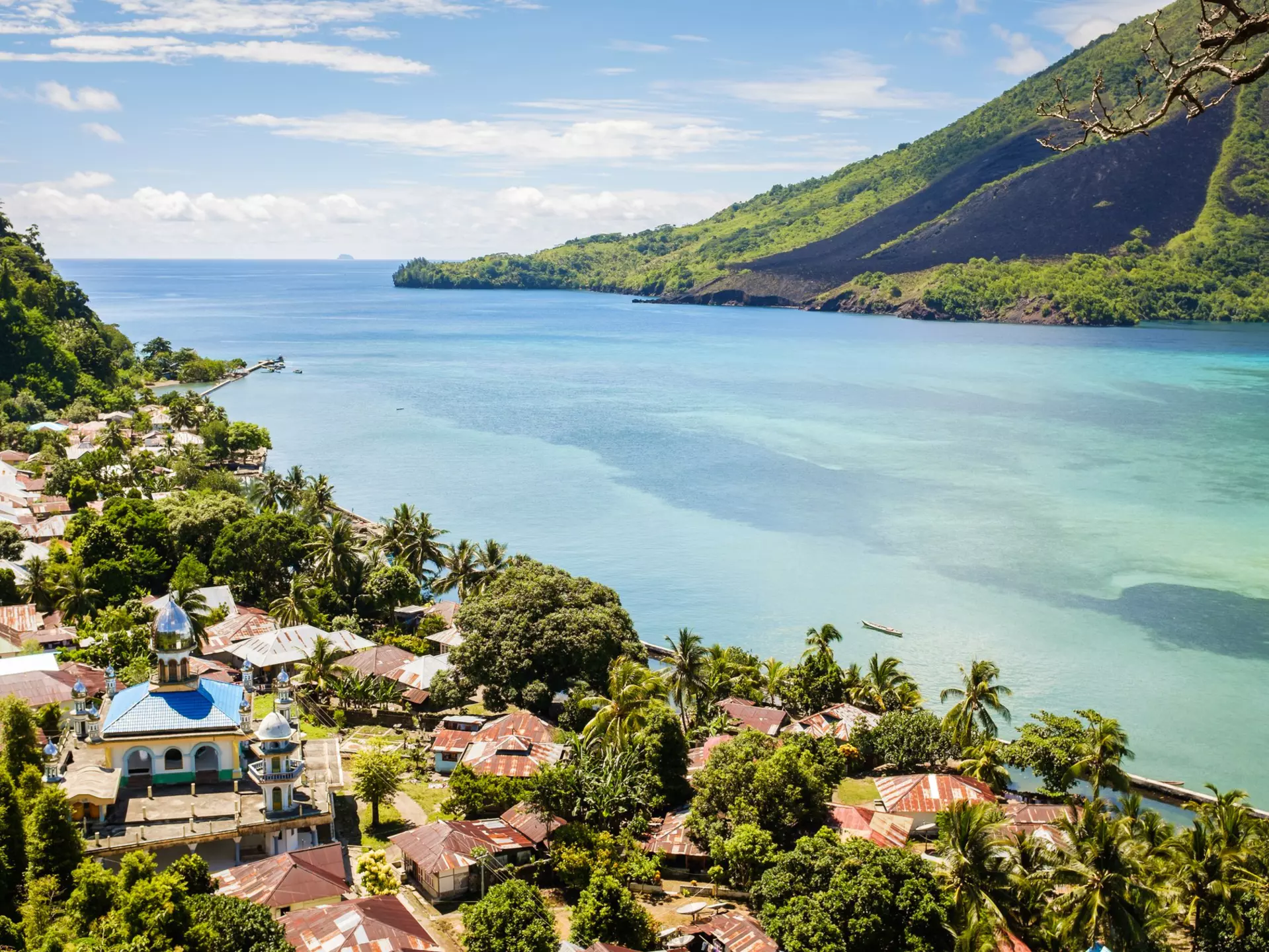 Hike, surf and learn about Sumatra's diverse culture with these top travel itineraries. Croesej/Getty Images