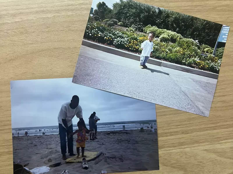 Snapshots of a family scattered on a table.
