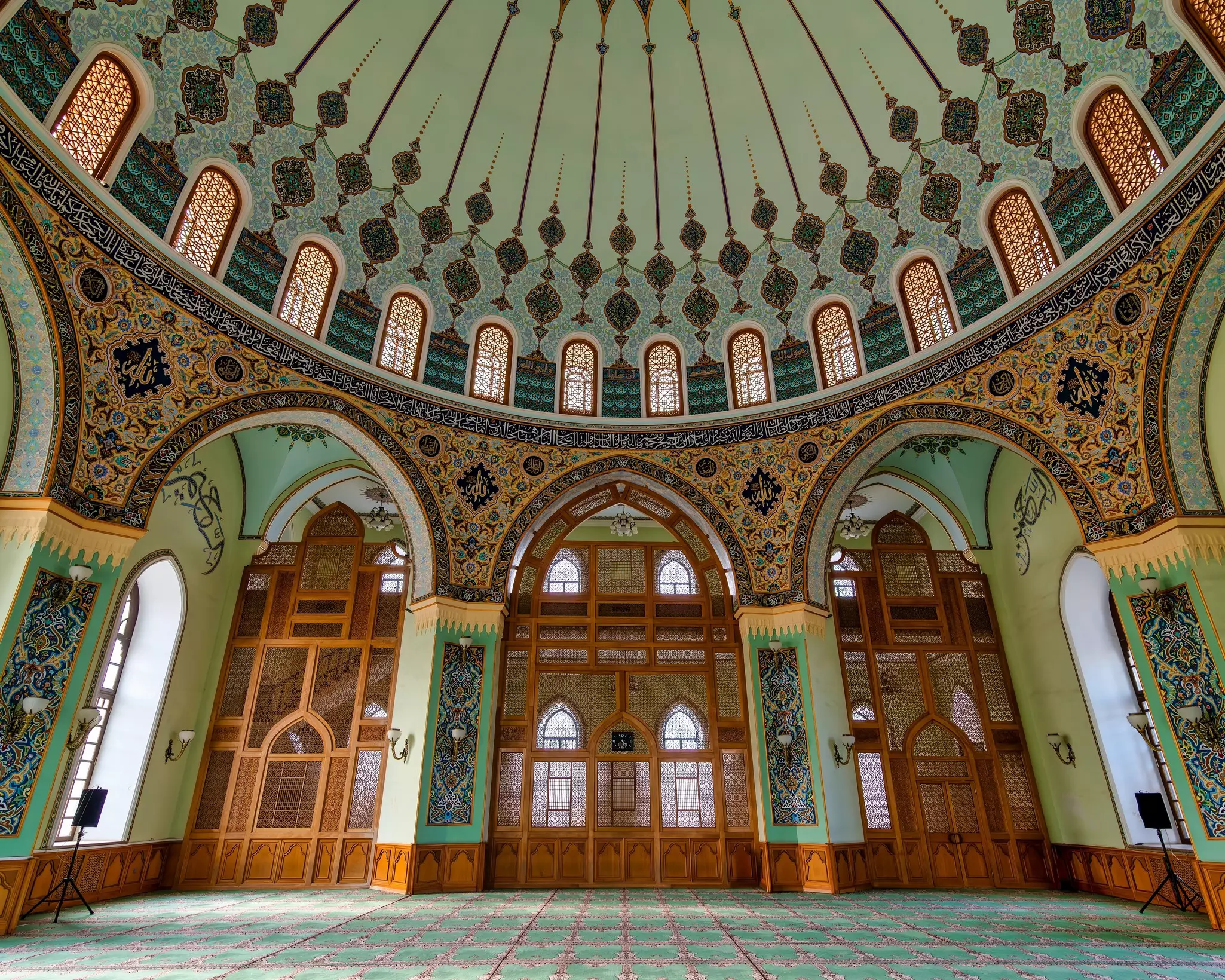 The interior of Taza Pir Mosque, showcases an exquisite dome and complex architecture that harmoniously combines traditional Islamic motifs with contemporary elements, nely Planet WIP, other: Rhianydd Hylton