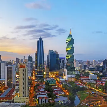 The skyline of Panama City with its skyscrapers in the financial district at sunset, Panama.