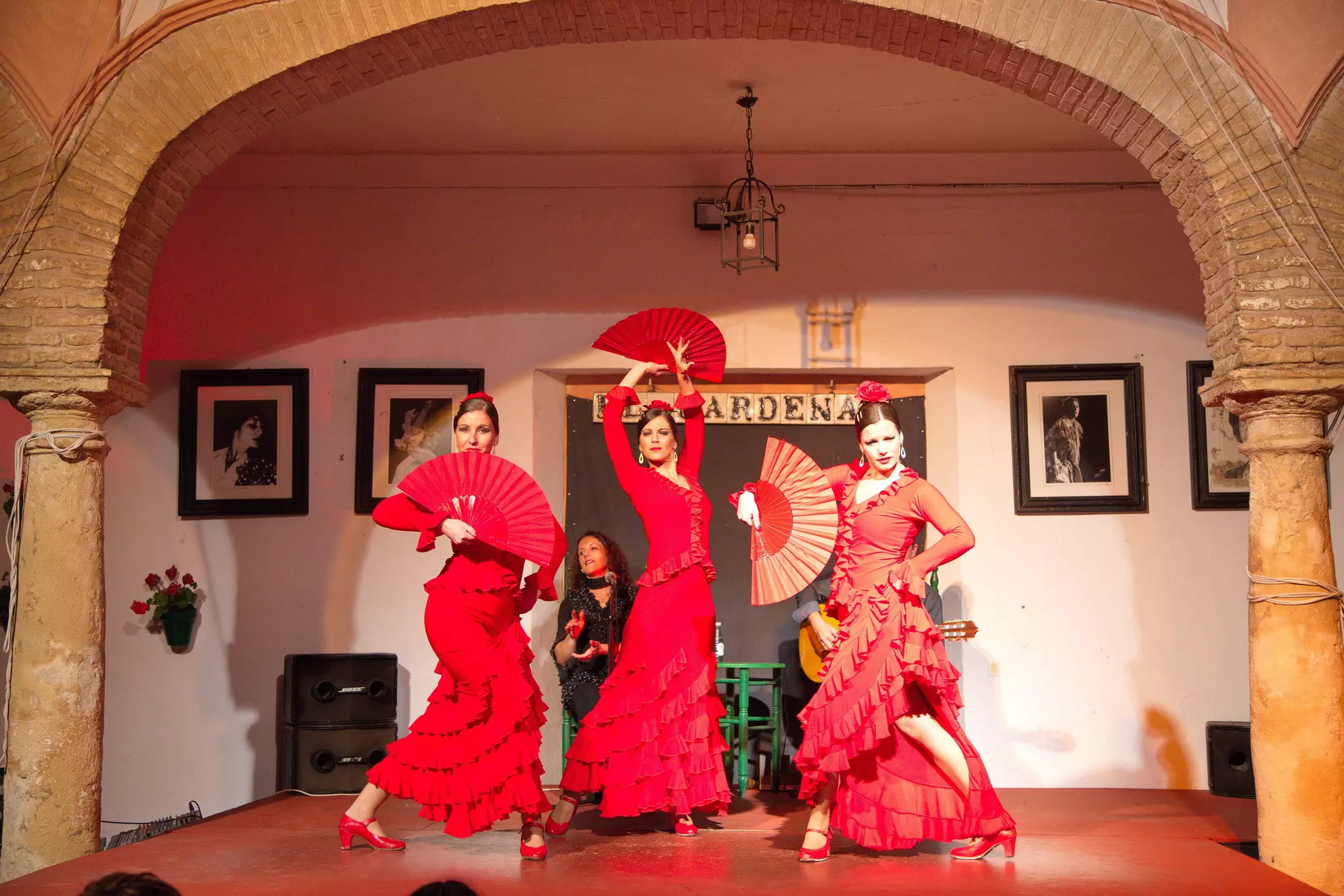 Flamenco dancers and singers performing at Tablao El Cardenal Flamenco Show Cordoba