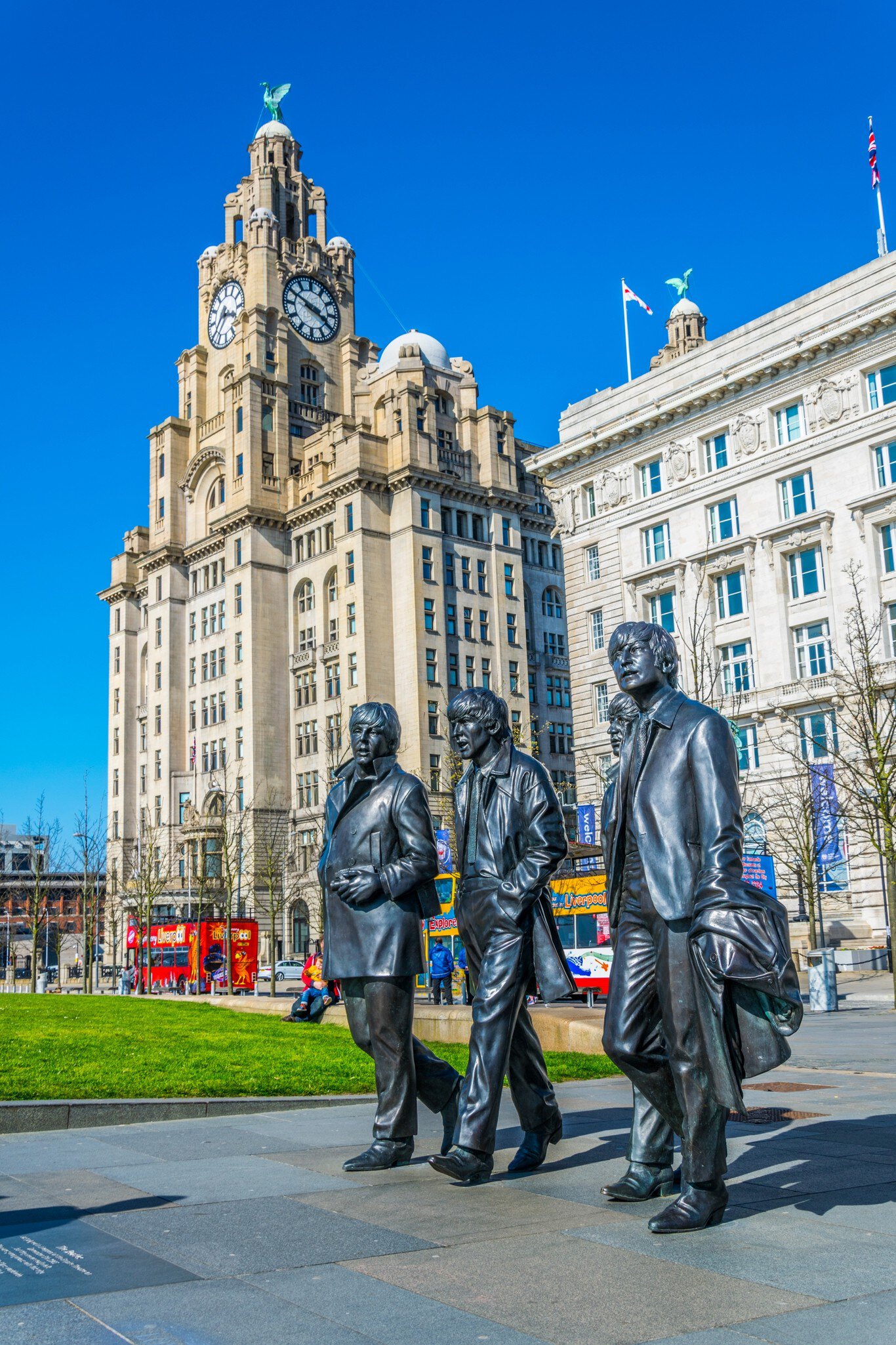 Statue of the Beatles in front of the royal liver building in Liverpool, England.