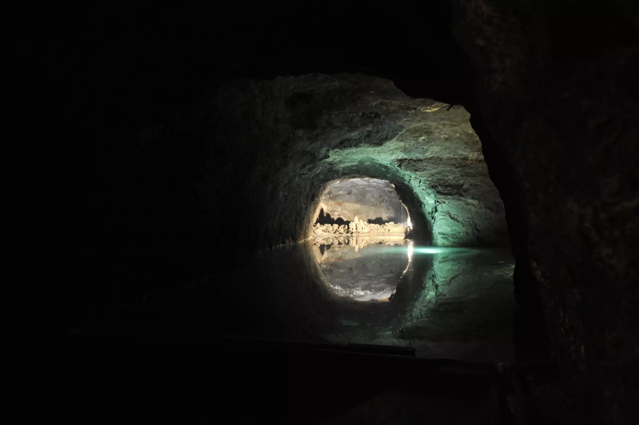 The water glows against the caves inside Seegrotte mine in Hinterbrühl