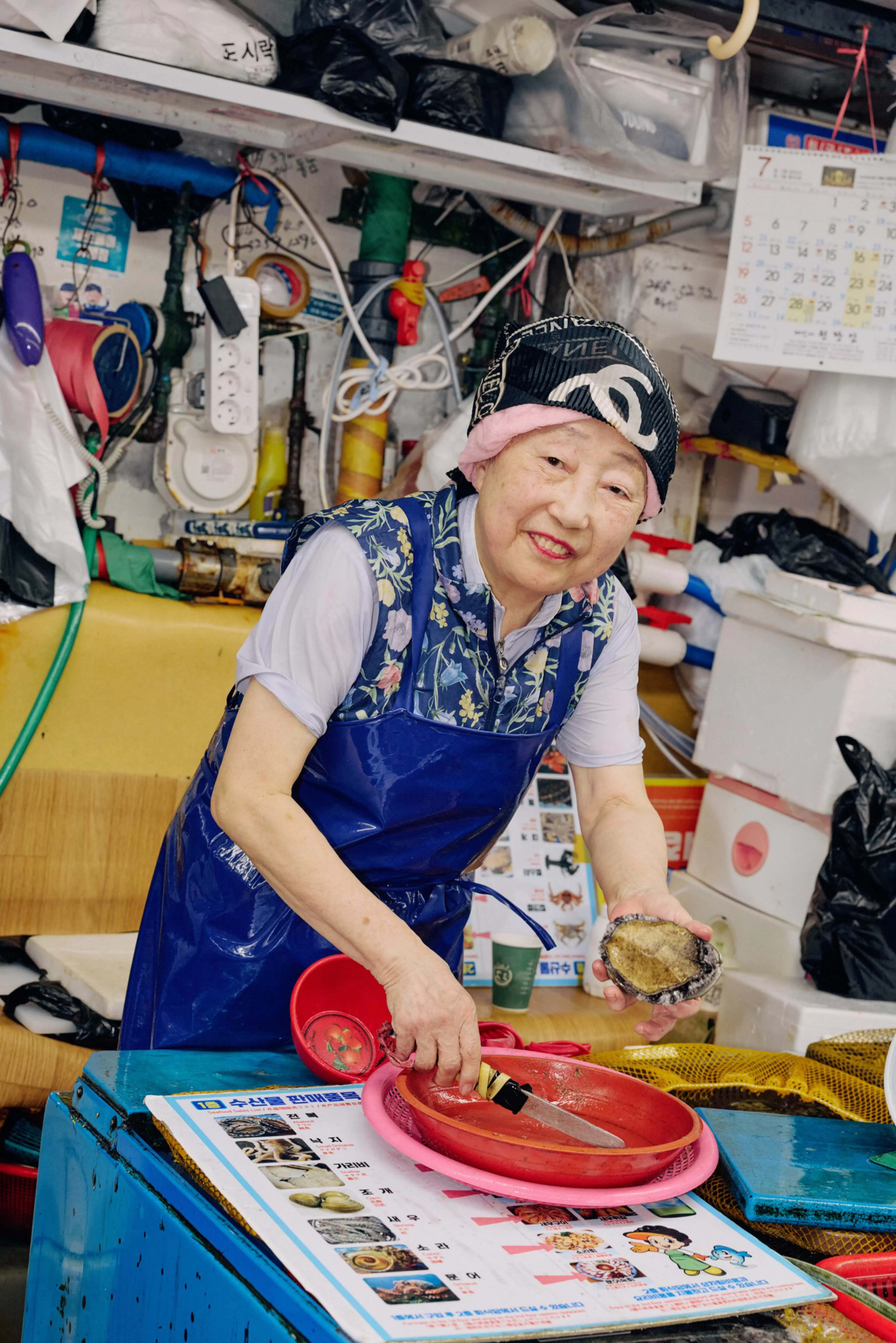 Kim Youngsoon preparing an order at the Jagalshi Fish Market