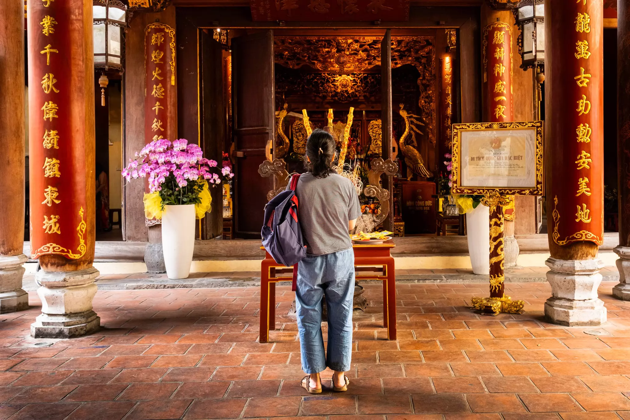 HANOI, VIETNAM — April 13, 2025
Praying in Bach Ma Temple, Hanoi