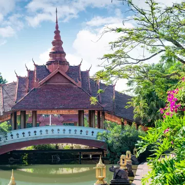 Dai architecture in Xishuangbanna's gardens. gyn9038/Getty Images