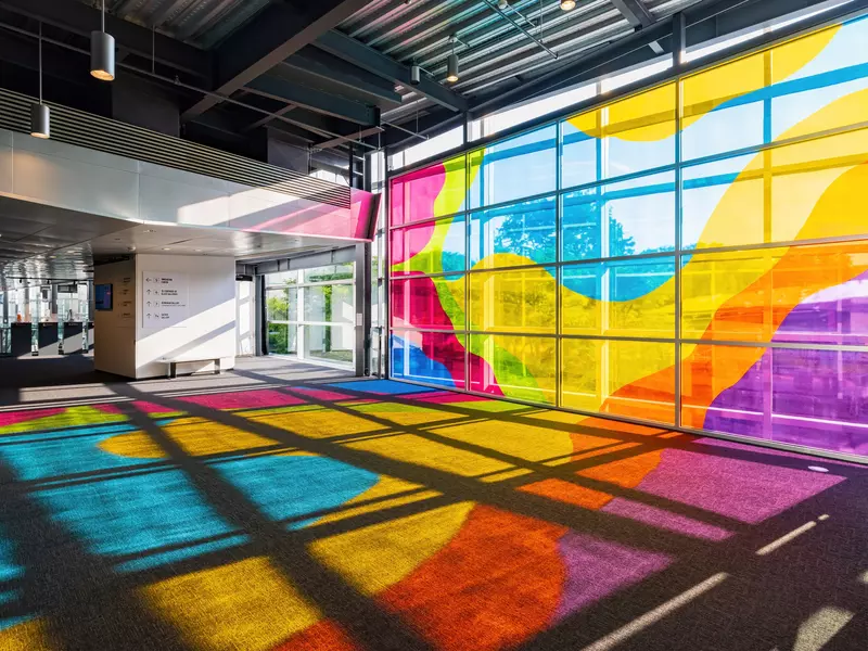 Multicolored glass casts colorful shadows in a museum in New York.