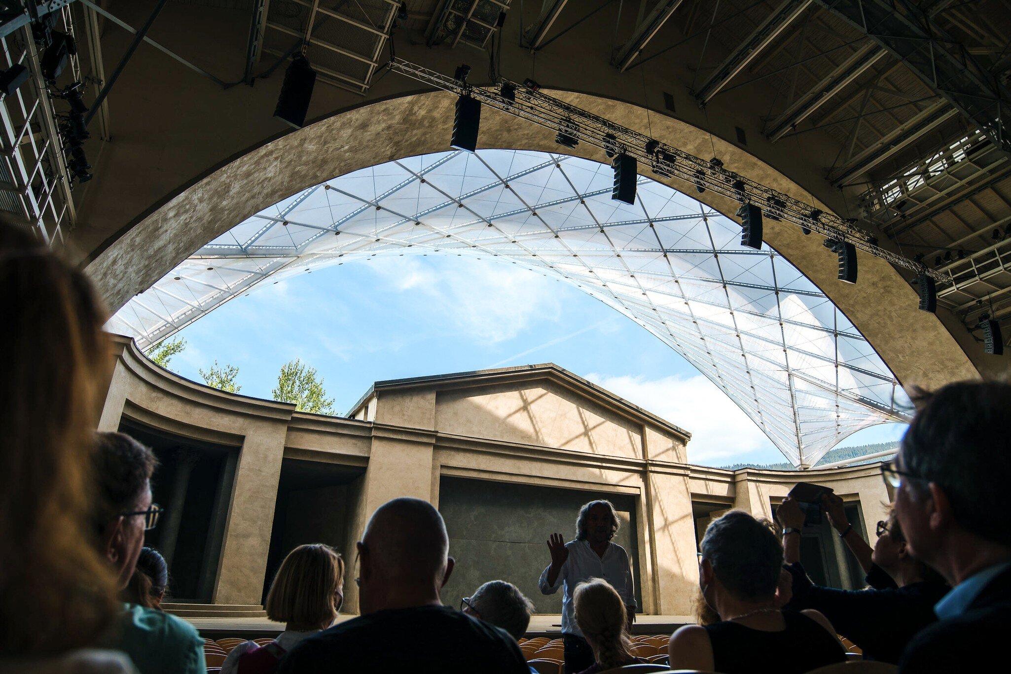The Passion Play director, Christian Stückl, talks to cast members of the 2022 Passion Play.