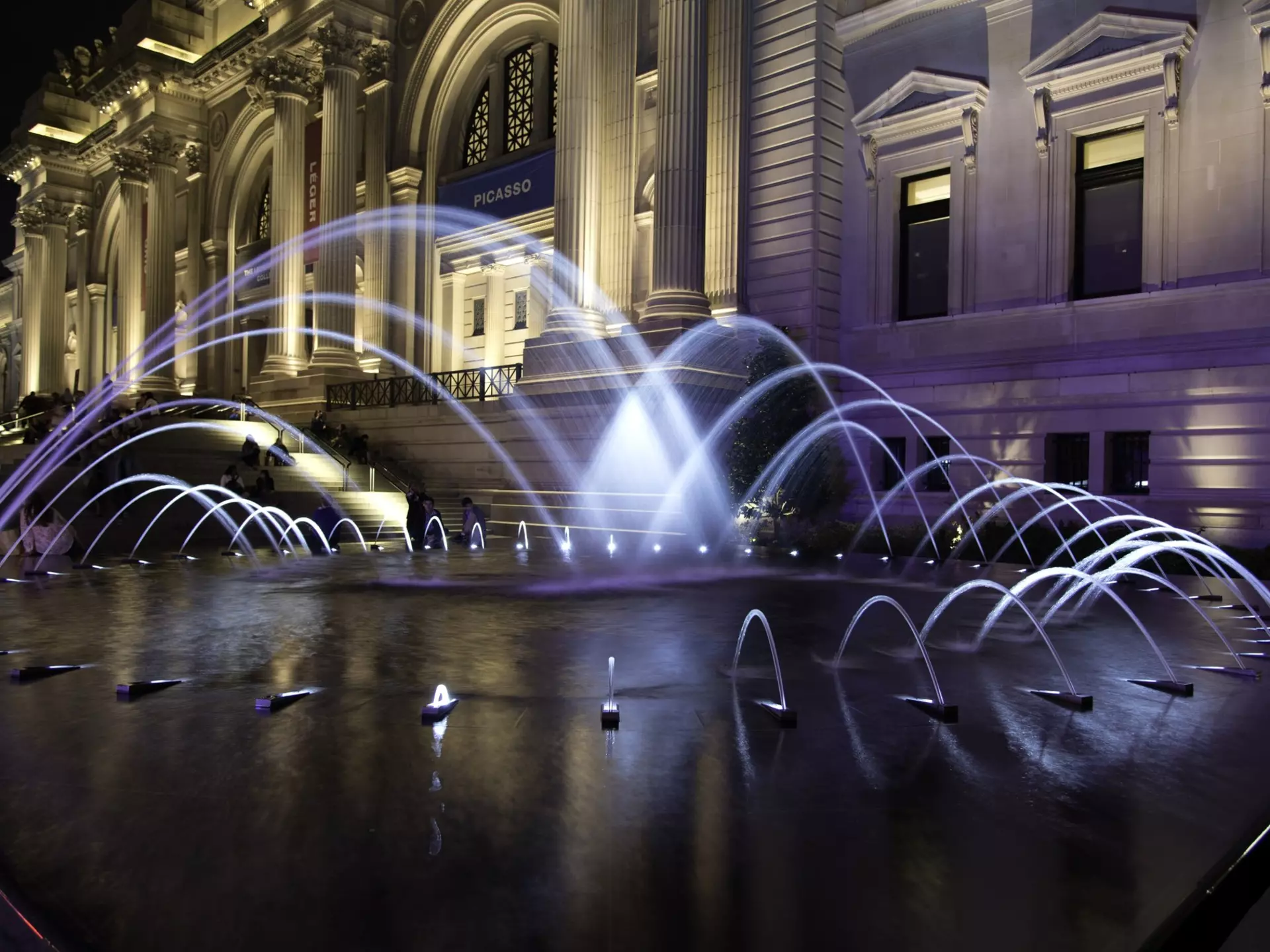 Illuminated fountain at entrance to Metropolitan Museum of Art, New York City, New York State, USA