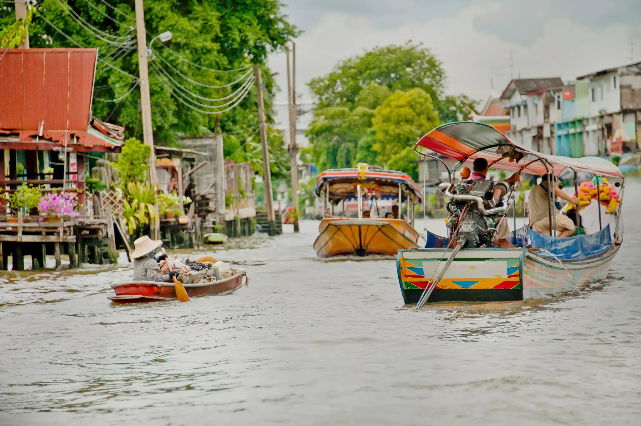 Rear view of longtail boats on a thai canal ( klong) in Bangkok, Thailand.,