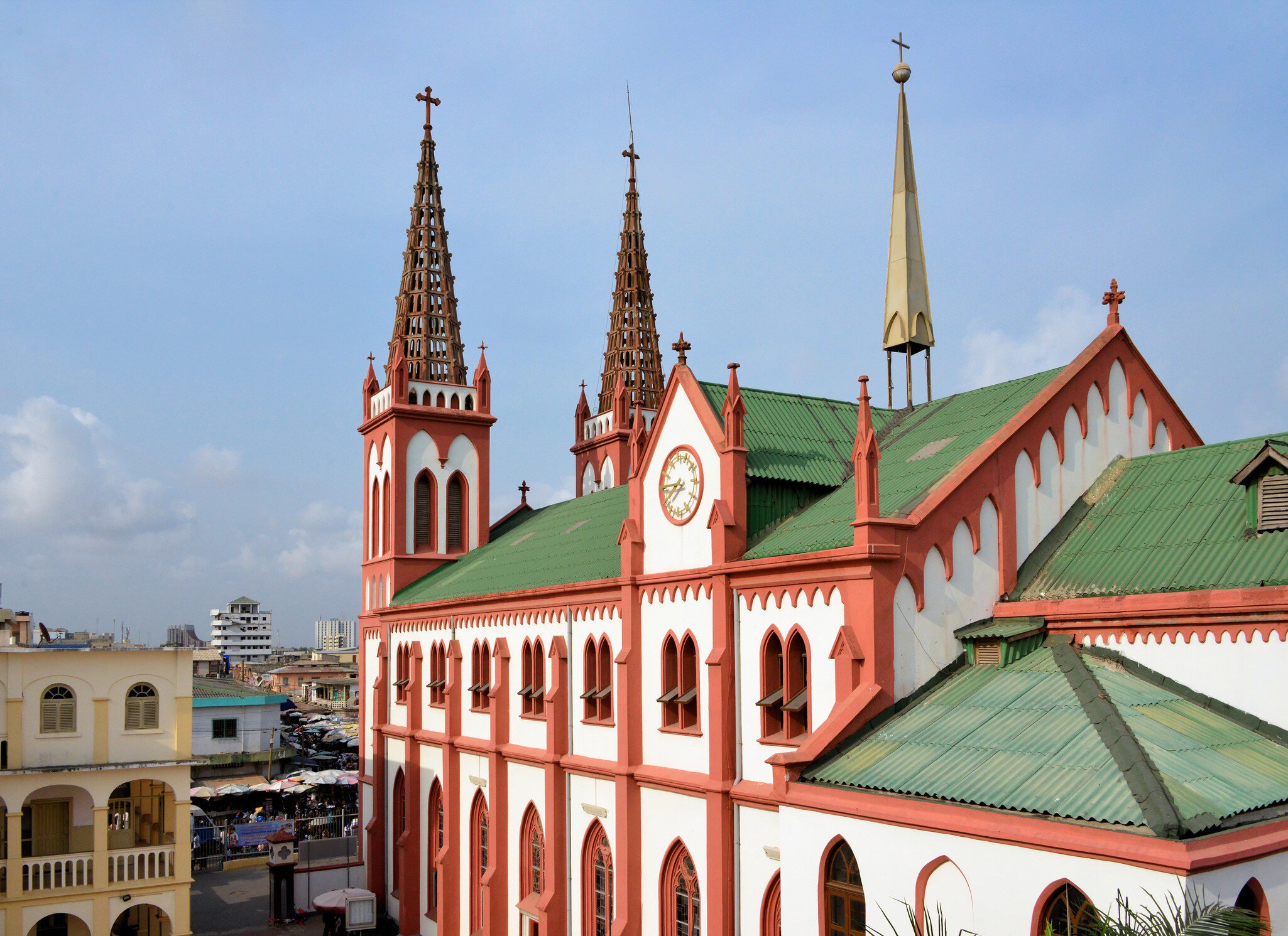 Lomé, Togo: Catholic Cathedral of the Sacred Heart, built by the Germans in 1901 - Gothic revival style with lattice work steeples - view towards Rue de l'Eglise - Cathédrale du Sacré-Cœur de Lomé / Herz-Jesu-Kathedralkirche