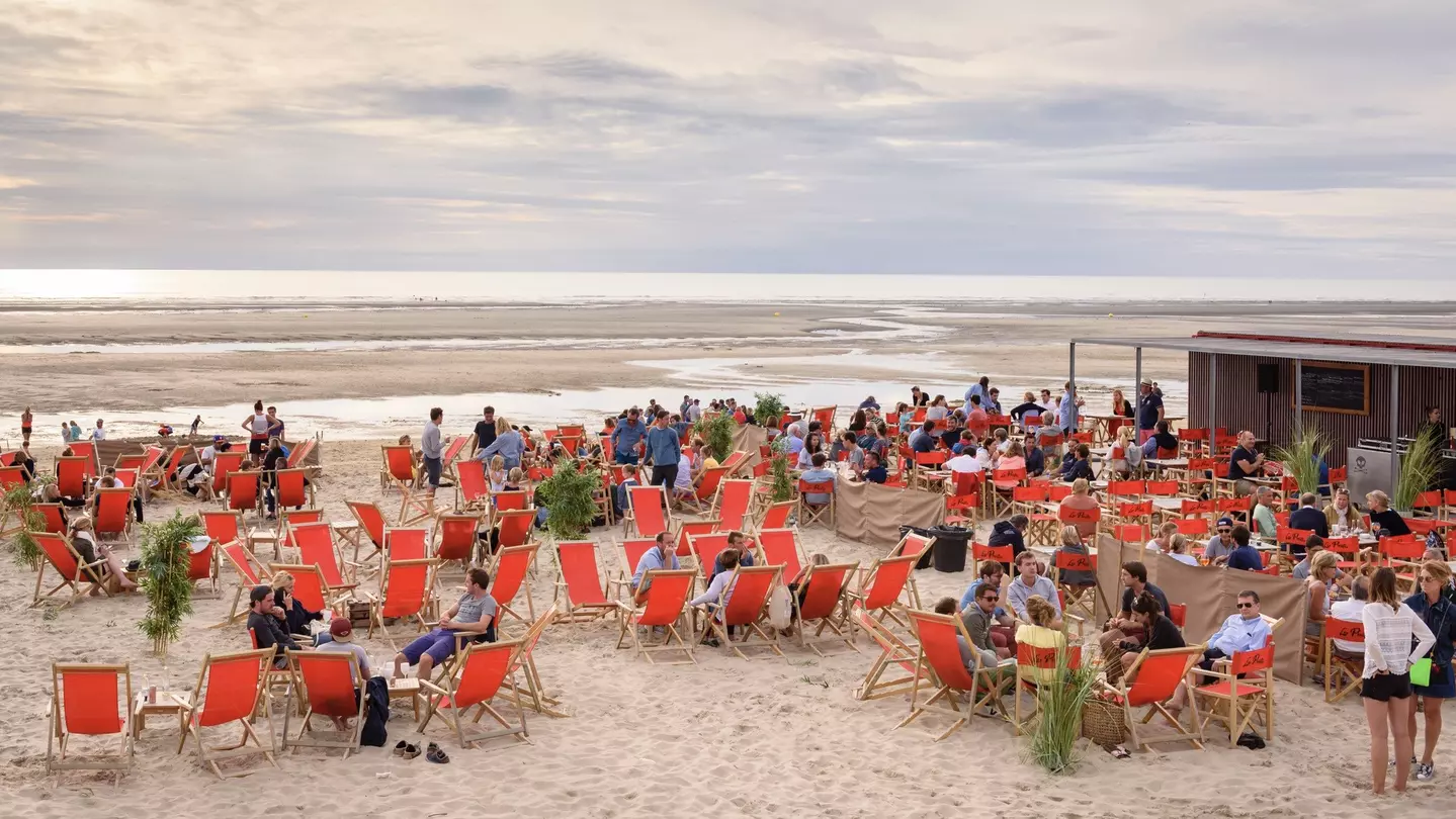 Le Touquet beach along France’s northwest coast features gorgeous skies – and a lively scene © Thomas Dekiere / Shutterstock