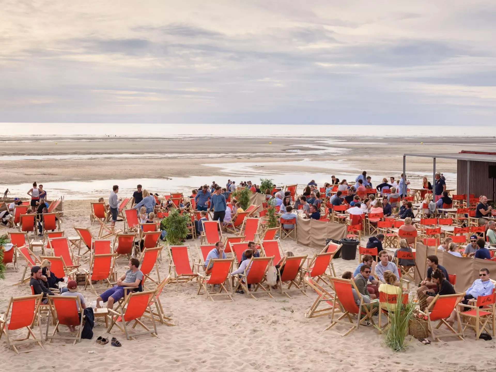 Le Touquet beach along France’s northwest coast features gorgeous skies – and a lively scene © Thomas Dekiere / Shutterstock