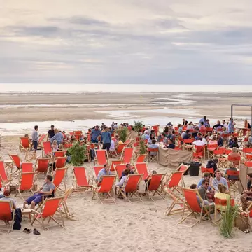 Le Touquet beach along France’s northwest coast features gorgeous skies – and a lively scene © Thomas Dekiere / Shutterstock