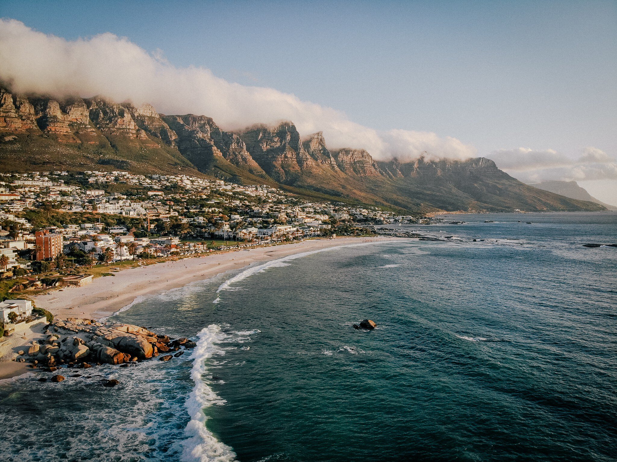 Beach and Twelve Apostles mountain in Camps Bay near Cape Town in South Africa.