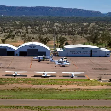 Aircrafts and buildings on Alice Springs airport, base of Royal Flying Doctor Service, in Alice Springs, Australia.