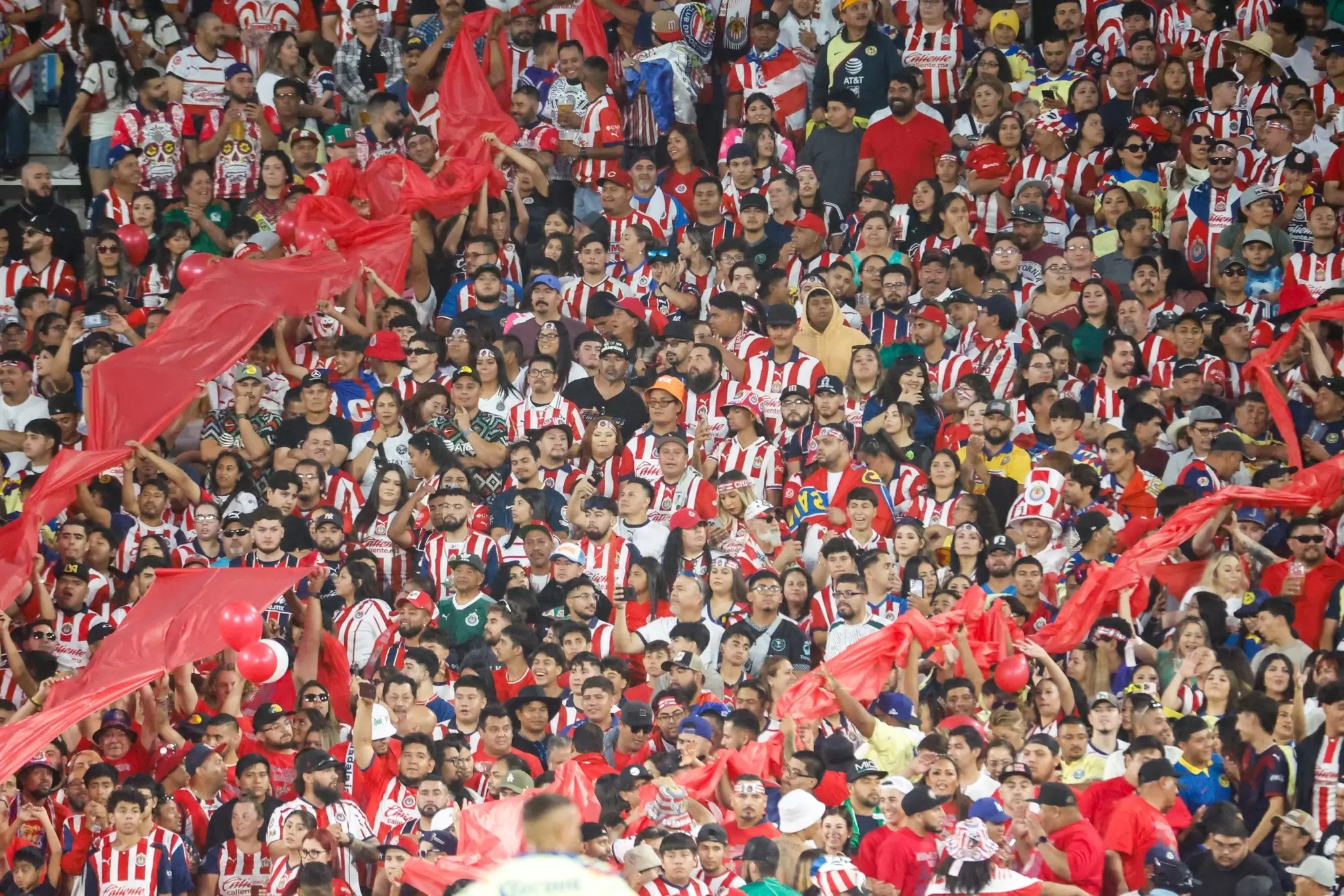 Soccer fans are seen during the Clásico de México soccer game between Chivas de Guadalajara and Club America at Rose Bowl stadium in Pasadena.
