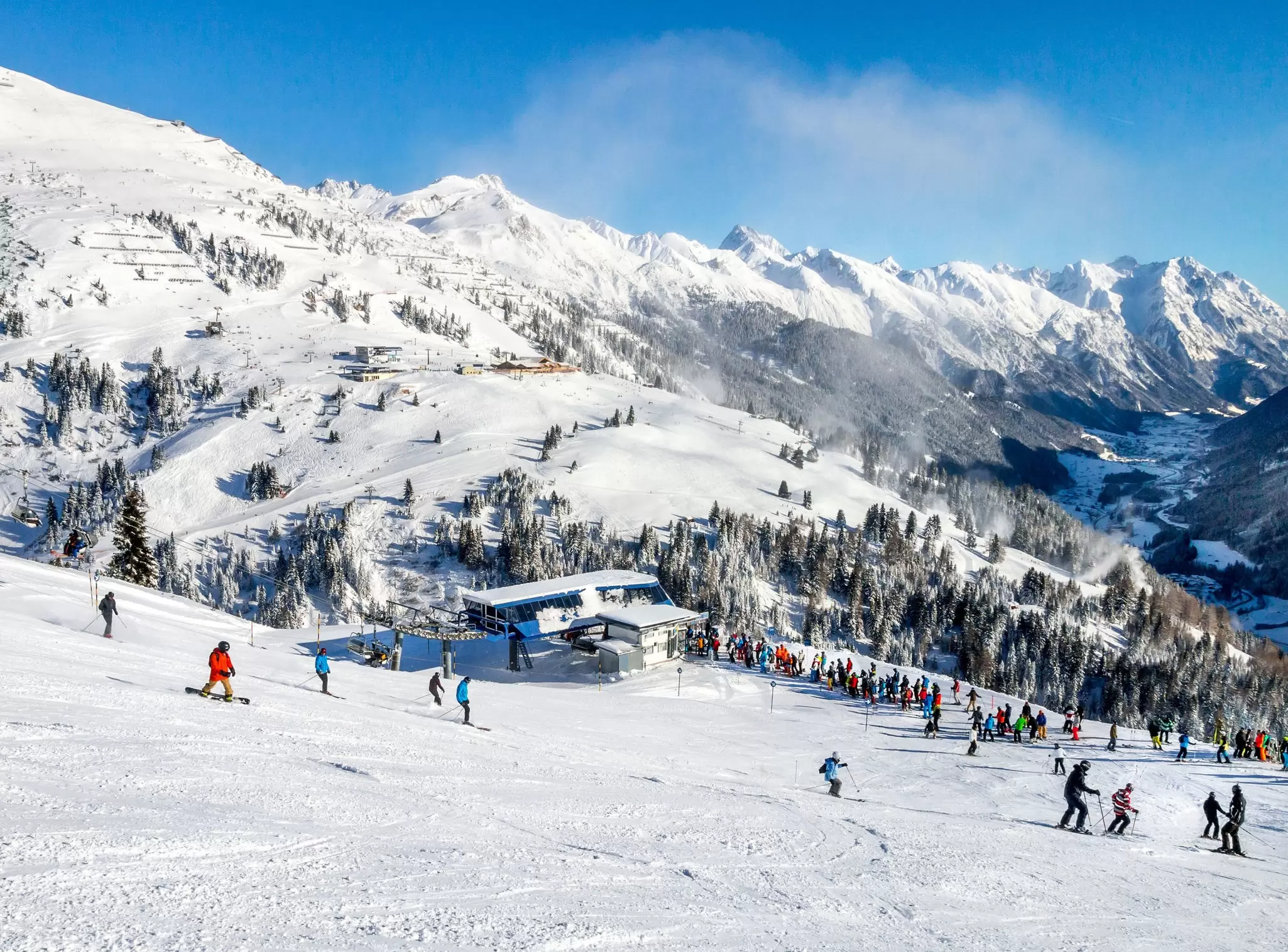 Skiers on the slopes at St Anton am Arlberg in the Austrian Alps