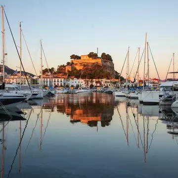 View of the Castillo de Dénia from across the water in Spain.