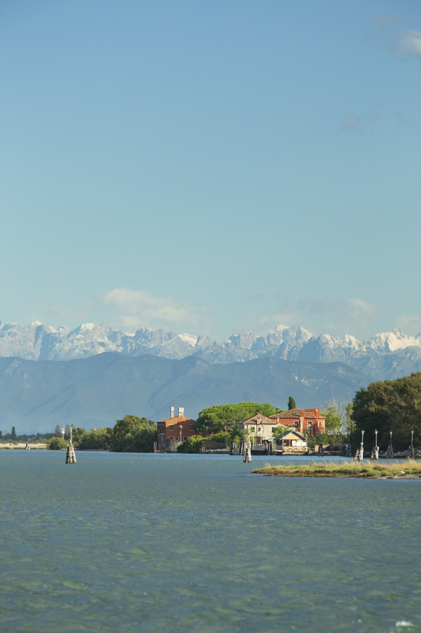 View of Torcello island and peaks of the Dolomites.