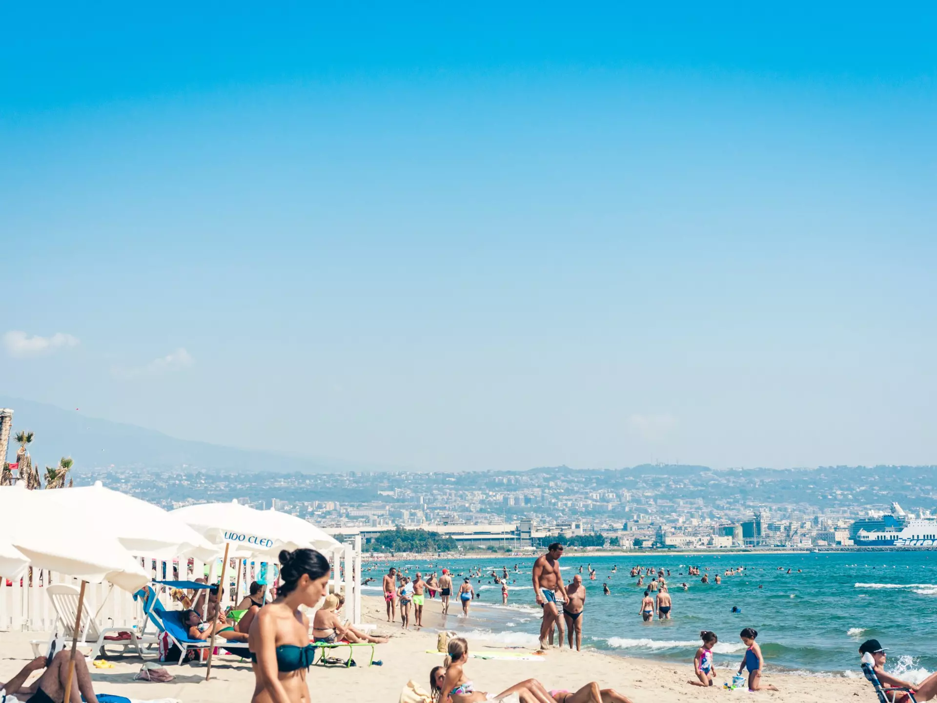 The family-friendly town of Catania, Sicily is a popular family beach destination. InnaLu/Shutterstock