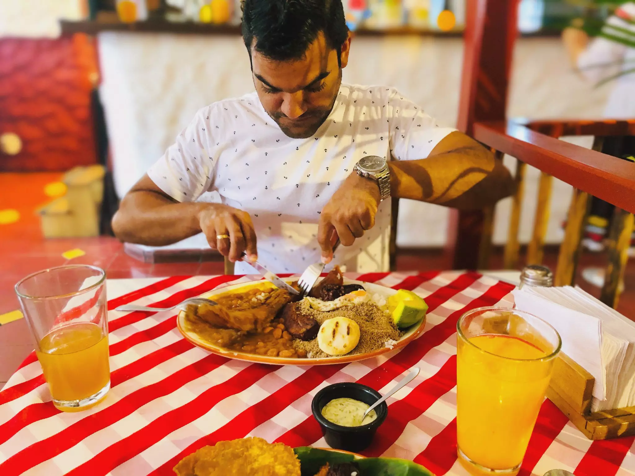 The bandeja paisa is a massive dish with 10 different ingredients, all served on an oval plate © Yuki Mao / Getty Images