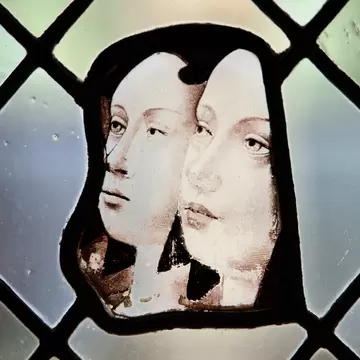 Detail of stained glass window in Cloitre de La Psalette, Cathedral of  Saint Gatien, in Tours, France.