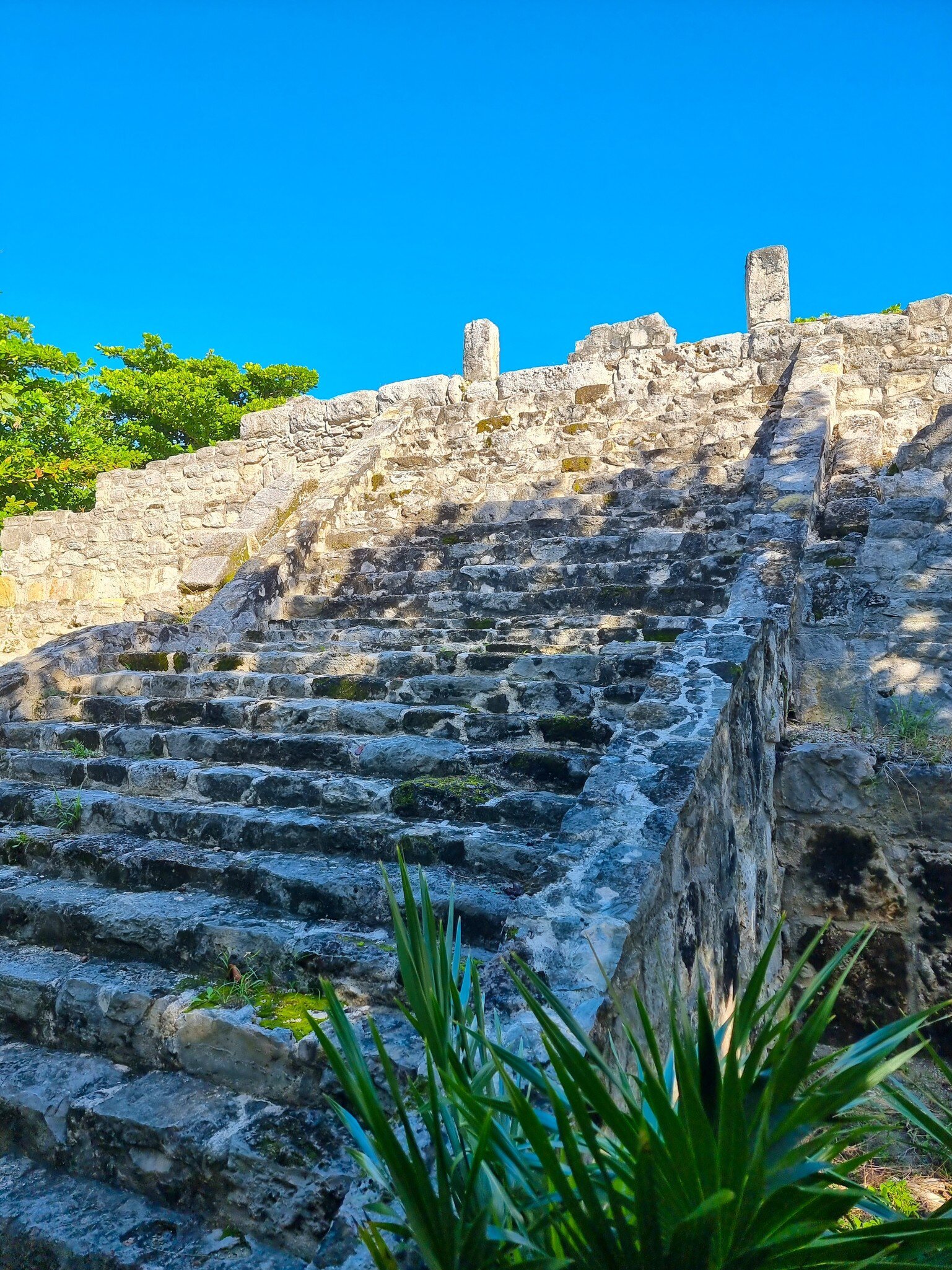 View of steps leading up to the Mayan Temple at the San Miguelito archaeological site in Cancún, Mexico.