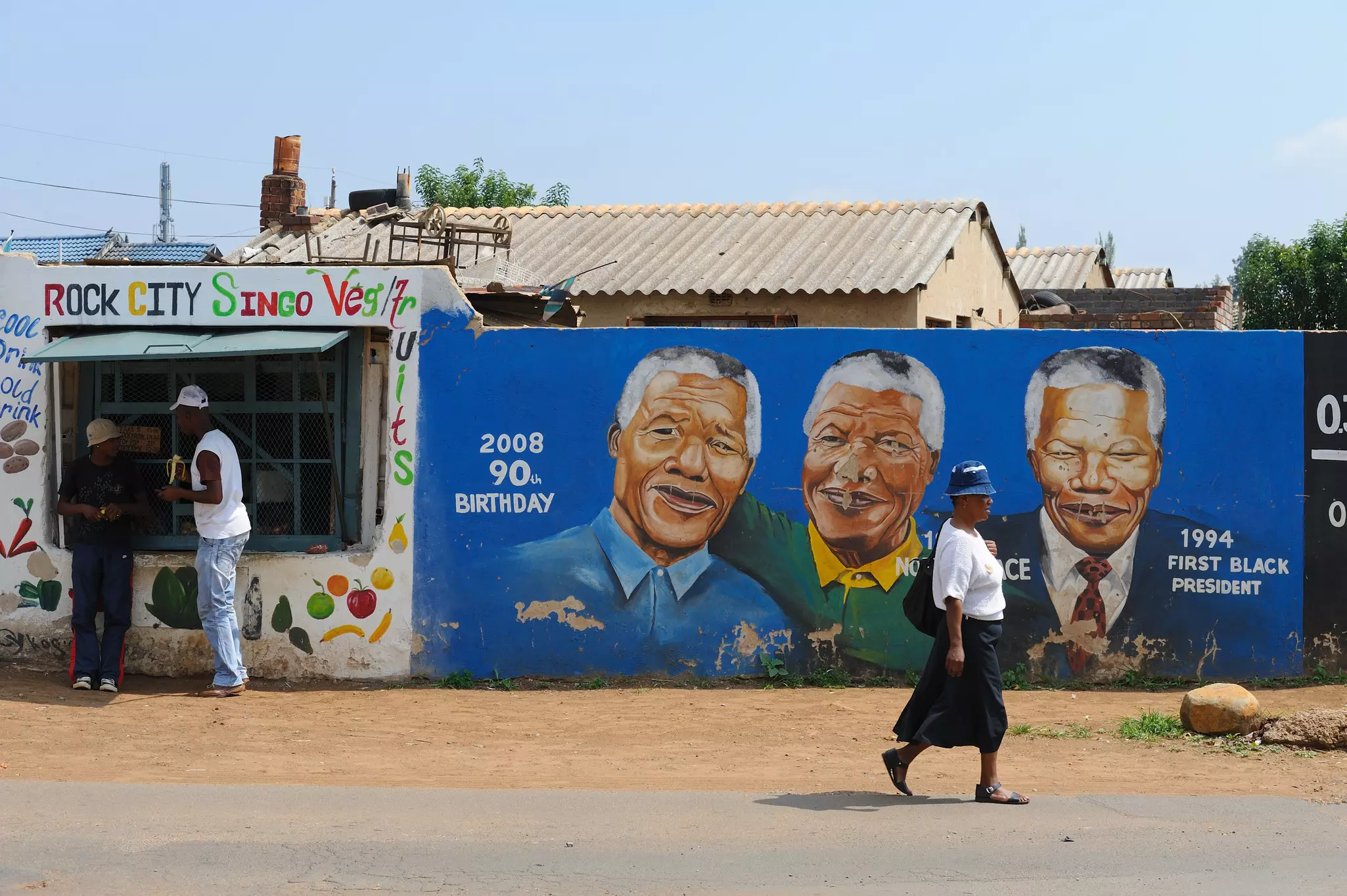 Mural painting illustrating anti-apartheid activist and former President of South Africa Nelson Mandela in the township of Orlando, in the urban area of Soweto. Soweto is a township of the City of Johannesburg Metropolitan Municipality.