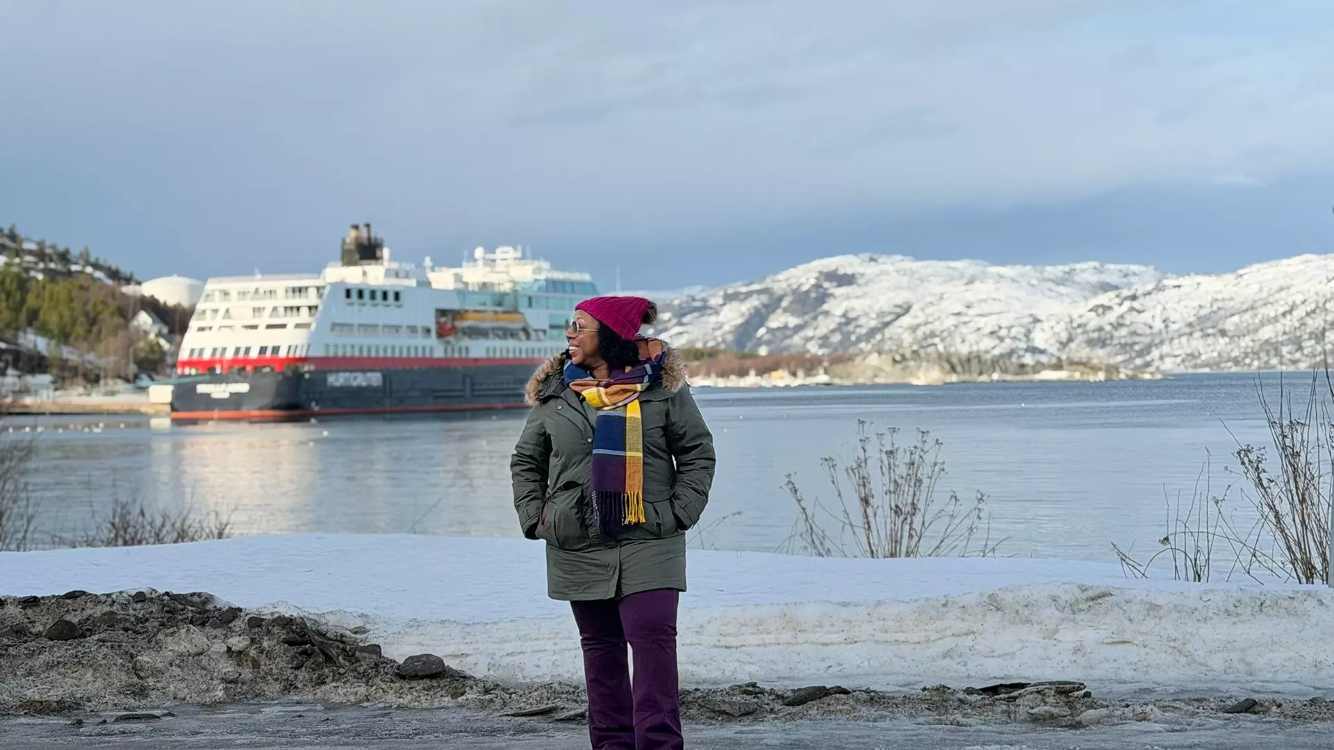 Eulonda in front of the Hurtigruten ship in Tromso Norway