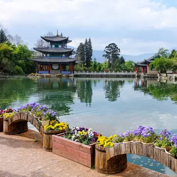 Chinese Traditional Pagoda, Pavilion and Arch Bridge at the Black Dragon Pool Park, Lijiang Old Town , License Type: media, Download Time: 2026-09-02T18:45:05.000Z, User: LP_NZhan, Editorial: false, purchase_order: 65050 - Digital Destinations and Articles, job: App Content, client: Lonely Planet App, other: Nadine Zhan 