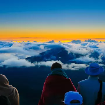Heading to Haleakalā National Park at sunrise is the best time to go. Don Land / Shutterstock