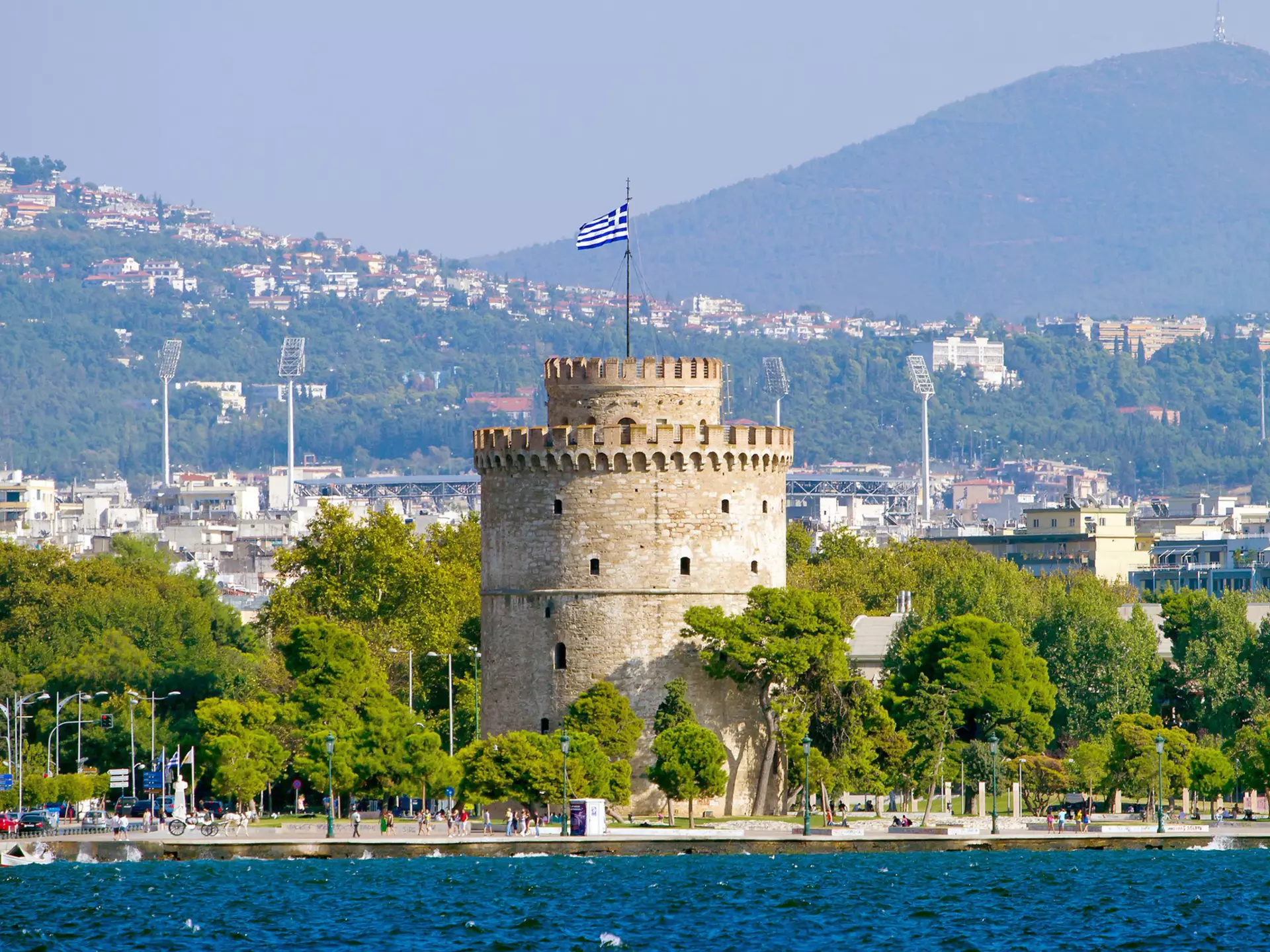 View of the White Tower on a sunny day in Thessaloniki, Greece.