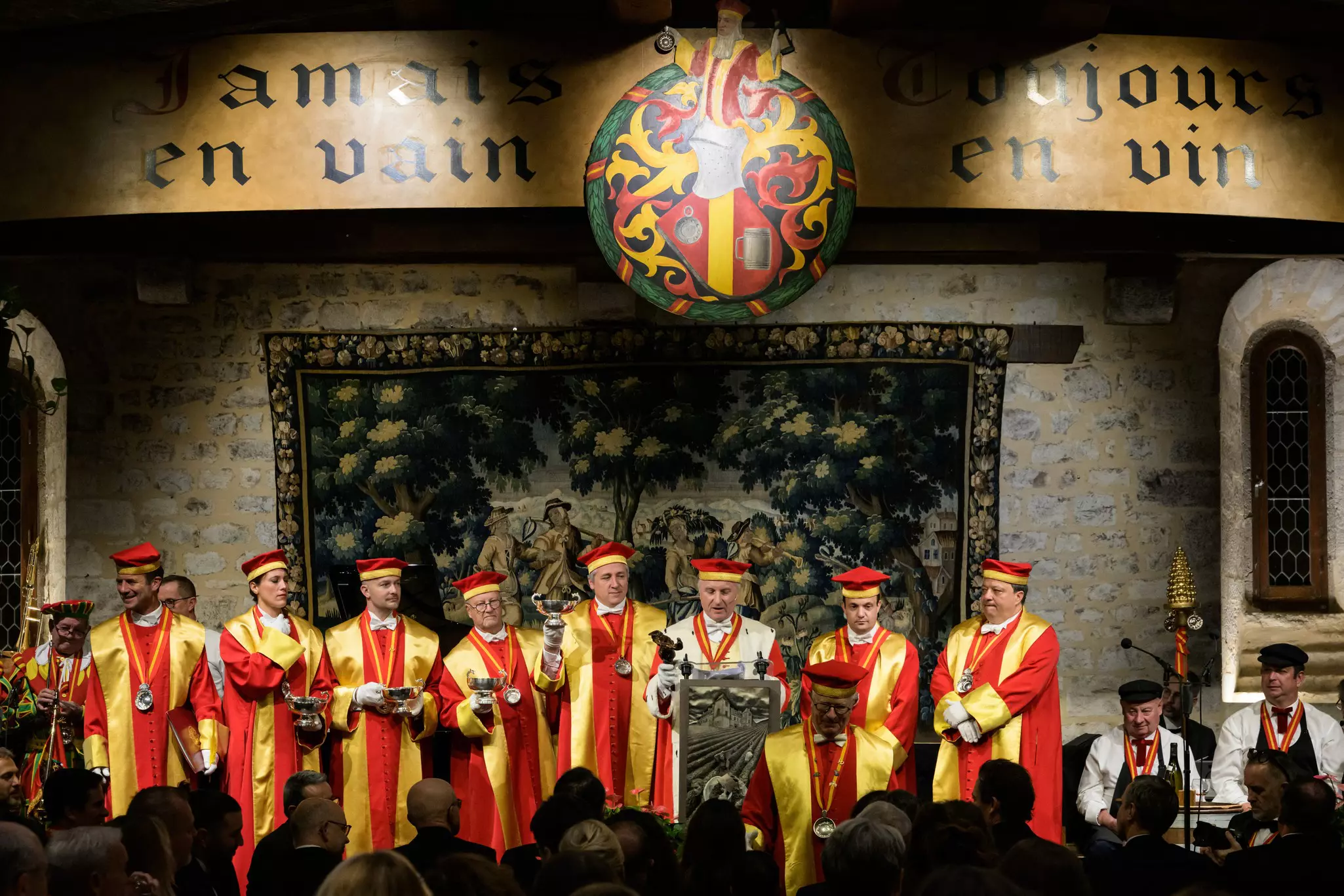 Grand Master and Grand Council members of the Knights of Tastevin brotherhood, stand on stage during the so-called "chapter" diner before the 164th Hospices de Beaune wine auction at Chateau du Clos Vougeot in Vougeot, central eastern France, on November 16, 2024. 550 guests came to celebrate this brotherhood founded in 1934, 90 years ago, to promote prestigious wines, and which today counts over 13,000 members worldwide. (Photo by Arnaud FINISTRE / AFP) (Photo by ARNAUD FINISTRE/AFP via Getty Images)
2184908927
Horizontal
Grand Master and Grand Council members of the Knights of Tastevin brotherhood, stand on stage during the so-called "chapter" diner before the 164th Hospices de Beaune wine auction at Chateau du Clos Vougeot in Vougeot, central eastern France, on November 16, 2024. 550 guests came to celebrate this brotherhood founded in 1934, 90 years ago, to promote prestigious wines, and which today counts over 13,000 members worldwide.