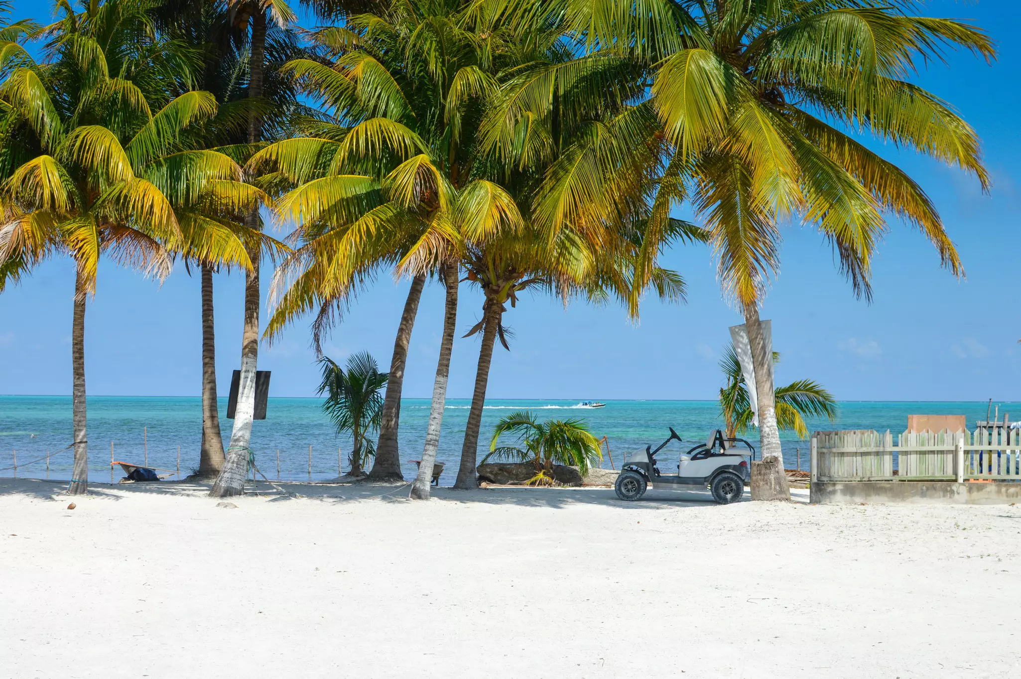 A golf cart is pretty much the only way to travel around on Caye Caulker © lanabyko / Getty Images