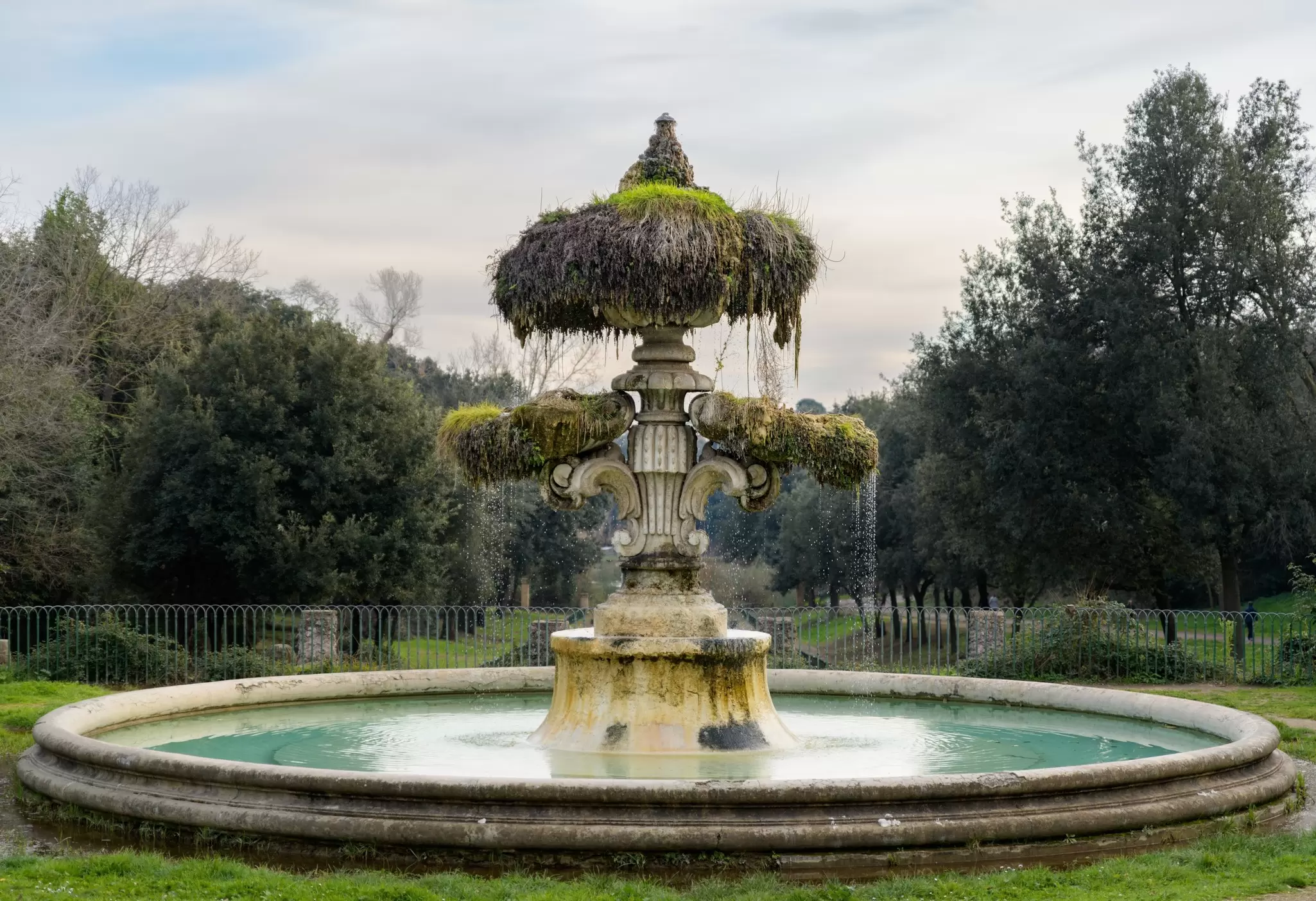 An ornate fountain in a garden.