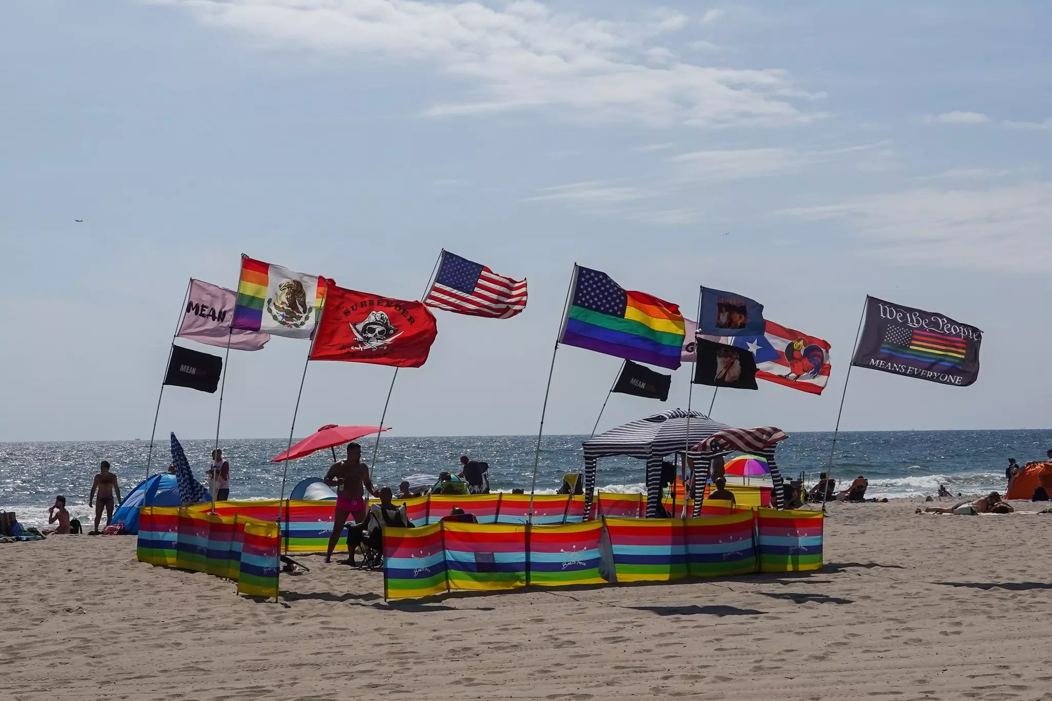 Sunbathers and swimmers fill the beach at Jacob Riis Park in Far Rockaway, Queens.