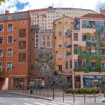  Frescoes of Lyon. View details of the facade with Fresco of the Wall of the Canutes. Lyon, France.