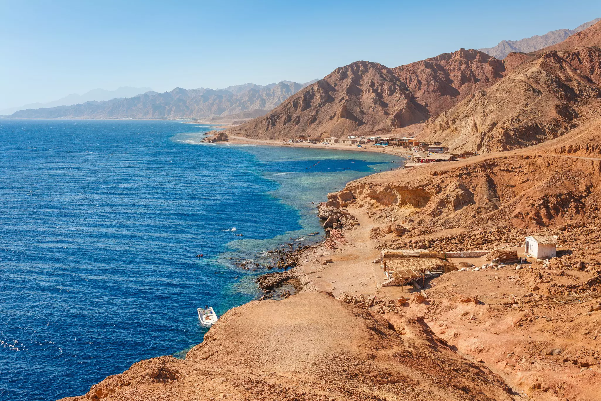 Sunny resort beach at the coast shore of Red Sea in Dahab, Sinai, Egypt, Asia in summer hot. Famous tourist destination Blue Hole near of Sharm el Sheikh. Bright sunny light, License Type: media, Download Time: 2025-11-13T15:58:48.000Z, User: joebindloss38, Editorial: false, purchase_order: 65050 - Digital Destinations and Articles, job: Online Editorial, client:  The 7 best hikes in Egypt, other: Joe Bindloss