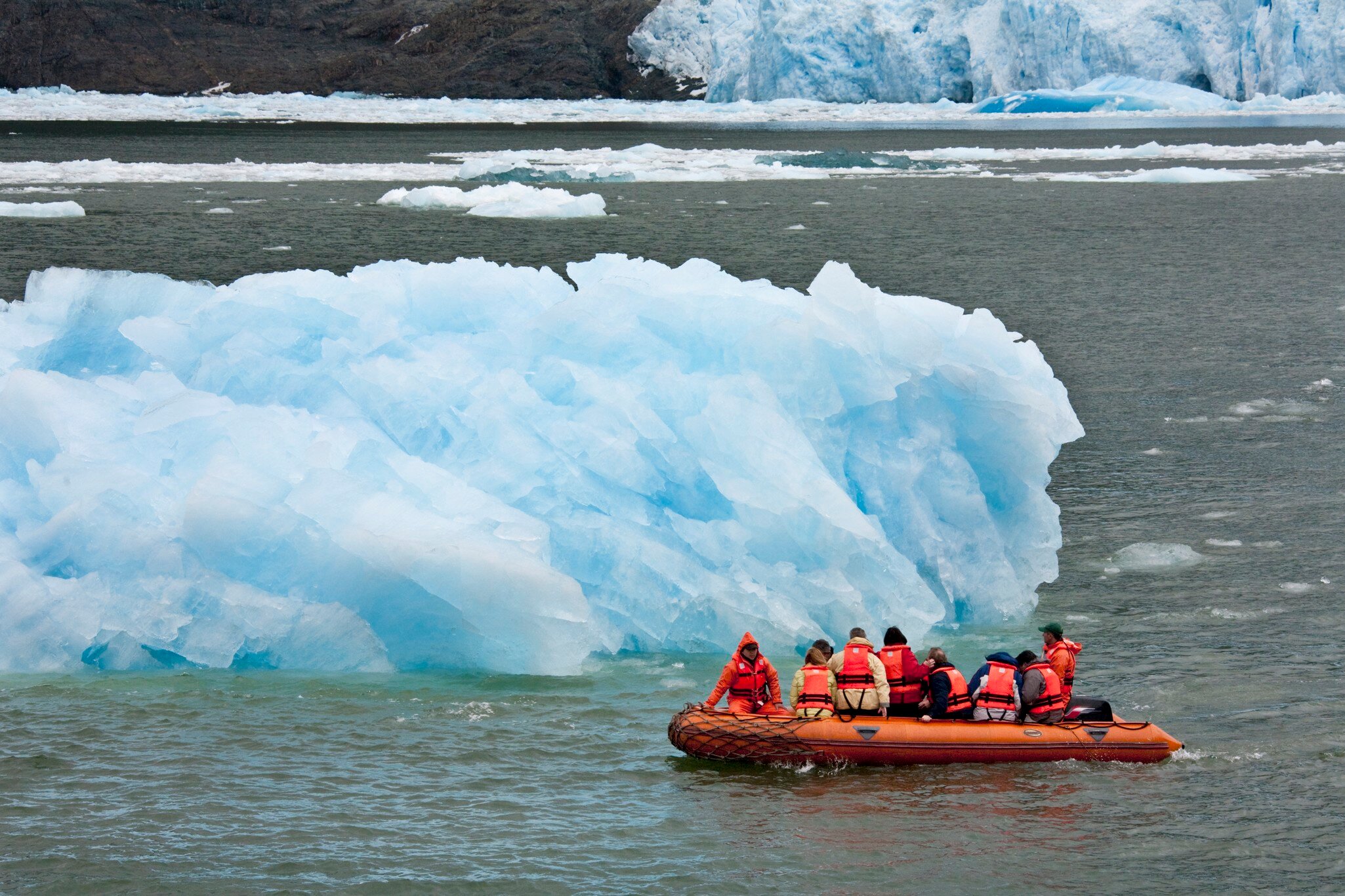 Adventure tourists near the San Rafael Glacier in the Laguna San Rafael National Park in the northern Patagonian Ice Field in southern Chile.
