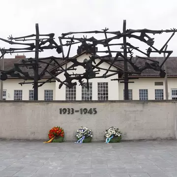 Munich/Germany-September 8 2017:.Exterior of camp facilities with memorial sculpture and wall,  at Dachau Concentration Camp, Munich, Germany.; 
KZ-Gedenkstätte Dachau

Shutterstock ID 760718488; your: Bridget Brown; gl: 65050; netsuite: Online Ed...