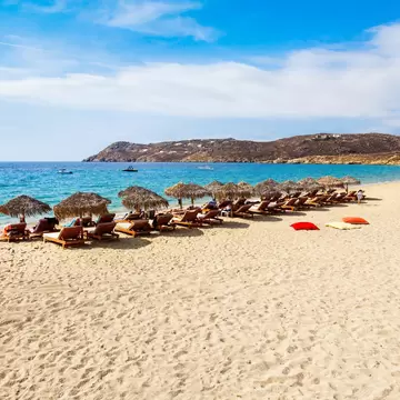 Elia Beach with yellow sand on the Mykonos island, Cyclades in Greece; Shutterstock ID 1975736576; your: Bridget Brown; gl: 65050; netsuite: Online Editorial; full: POI Image Update