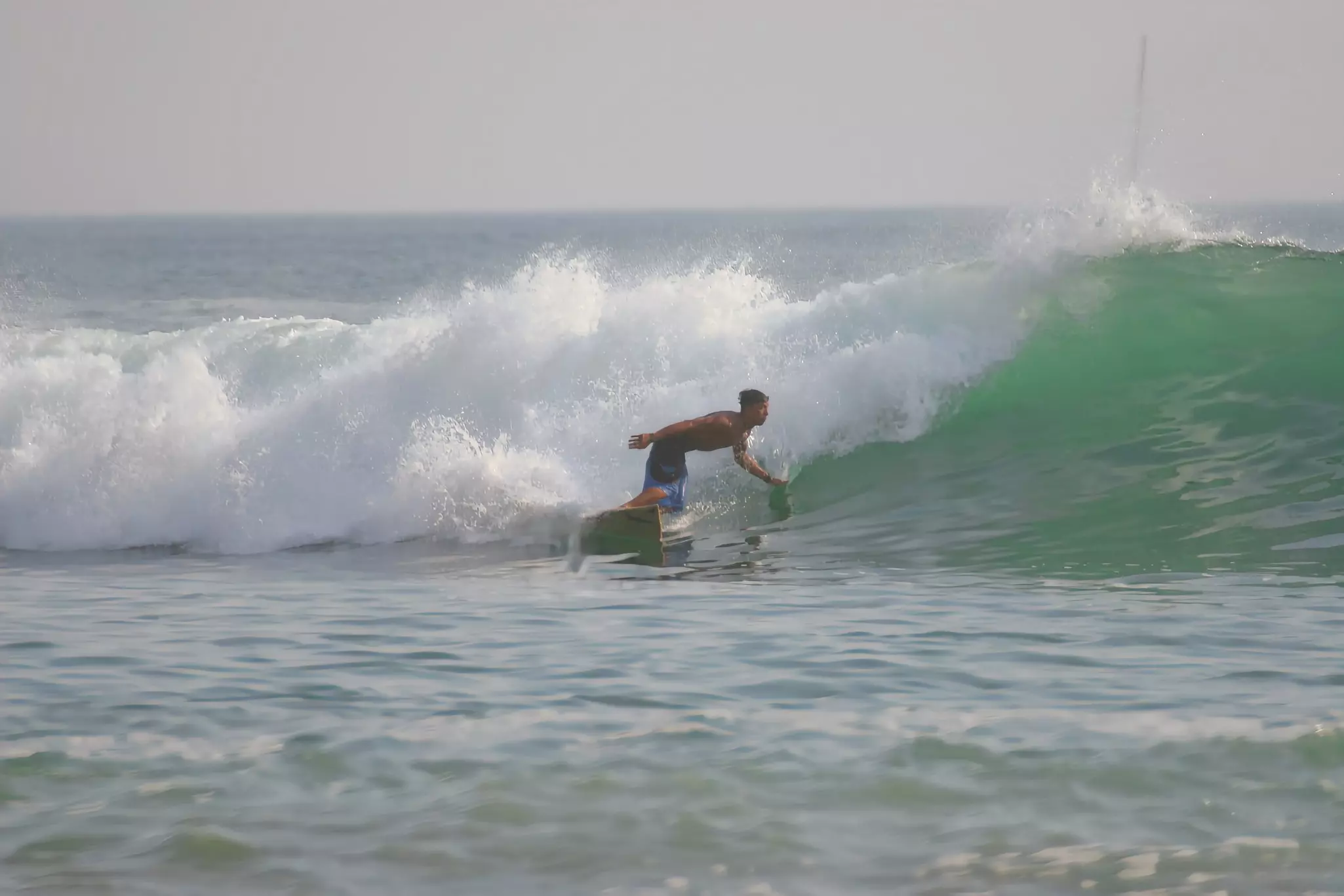 Surfing the big waves at Madera beach in Nicaragua