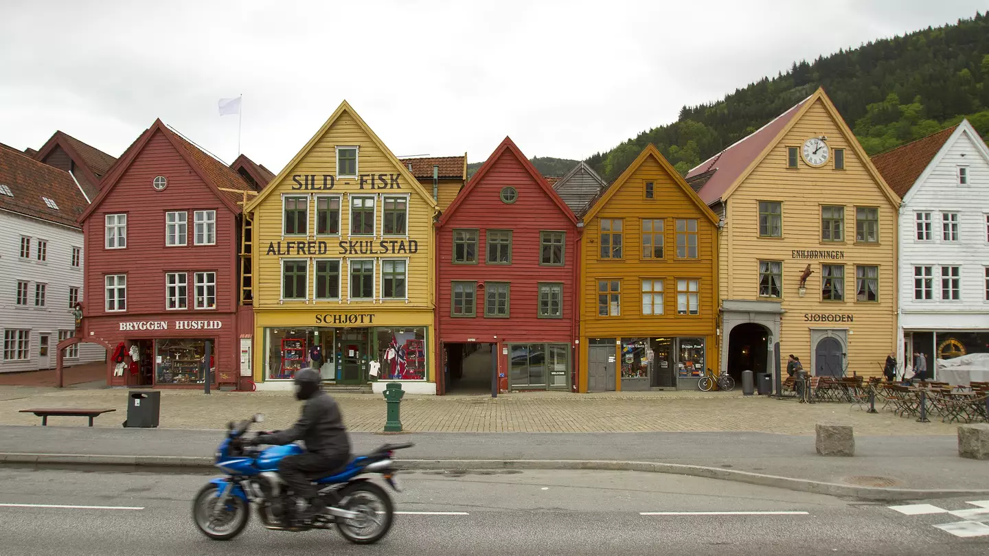 colourful buildings with a motorcycle in front of them