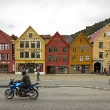 colourful buildings with a motorcycle in front of them