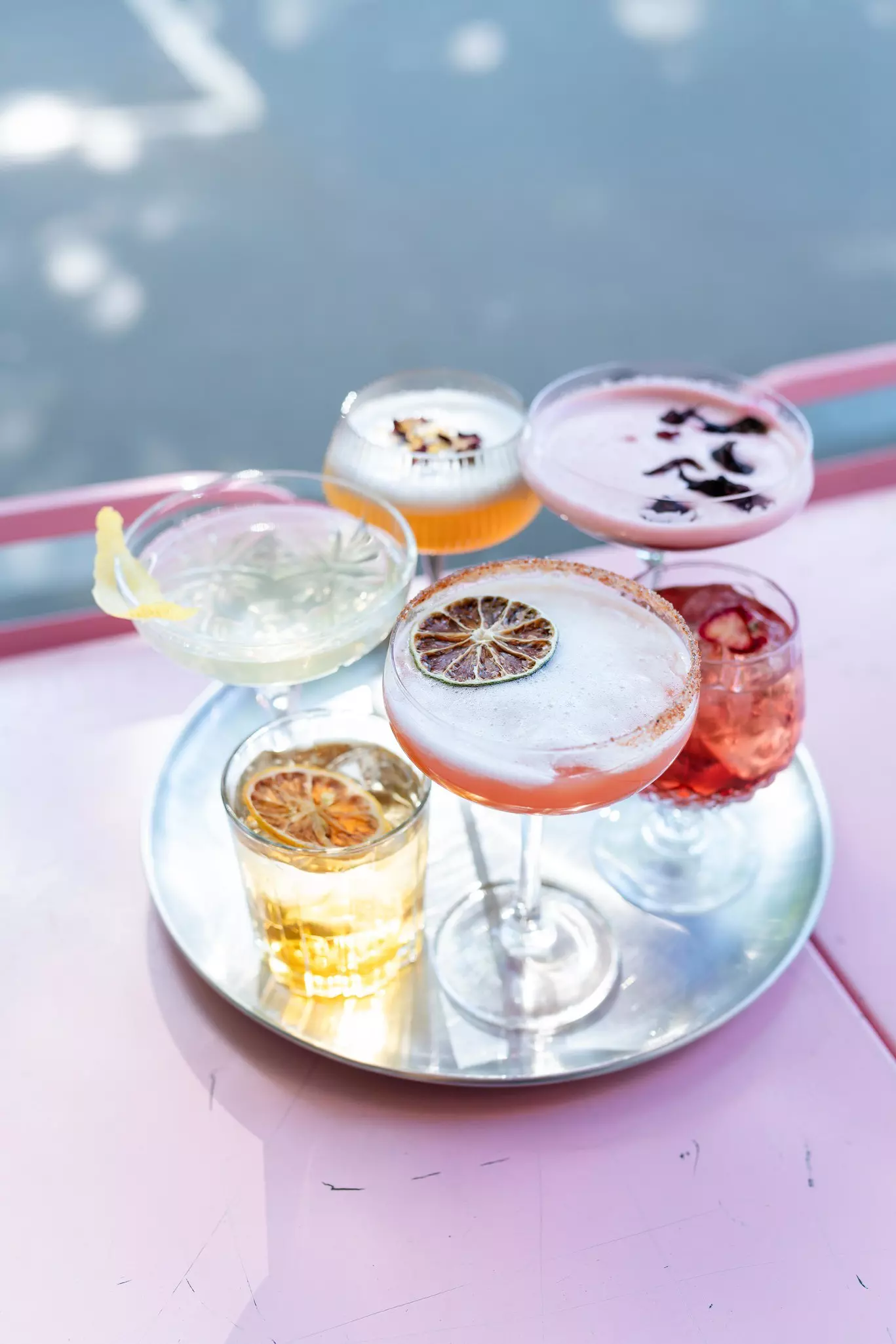 a tray of cocktails at a bar in Lille, France. 
