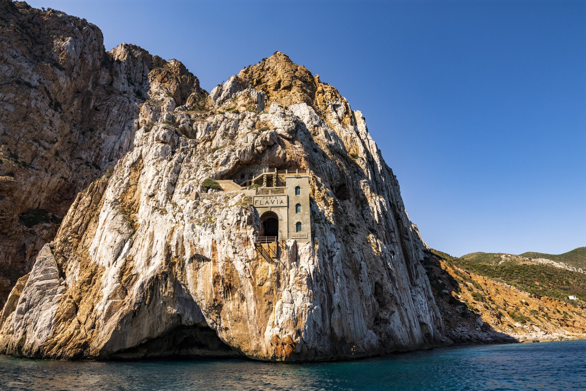 Porto Flavia, is a mine gallery designed by Engineer Cesare Vecelli in 1924, Masua, Sardinia; Italy; Shutterstock ID 668632018;