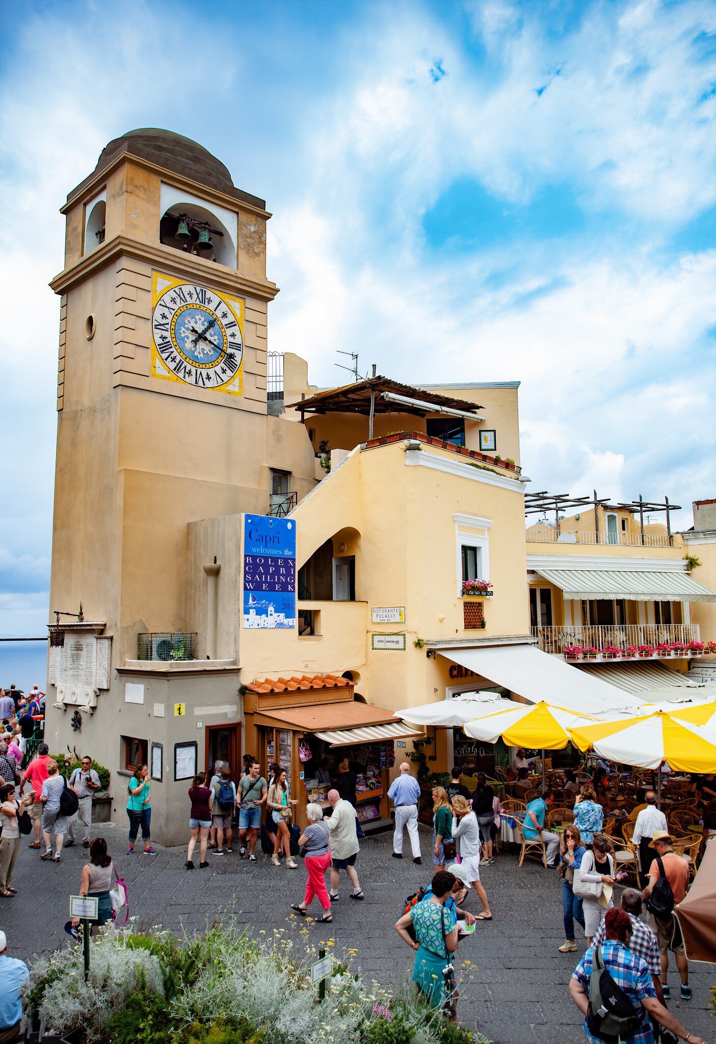 Tourists visit Piazza Umberto I, the most famous square of the island of Capri.